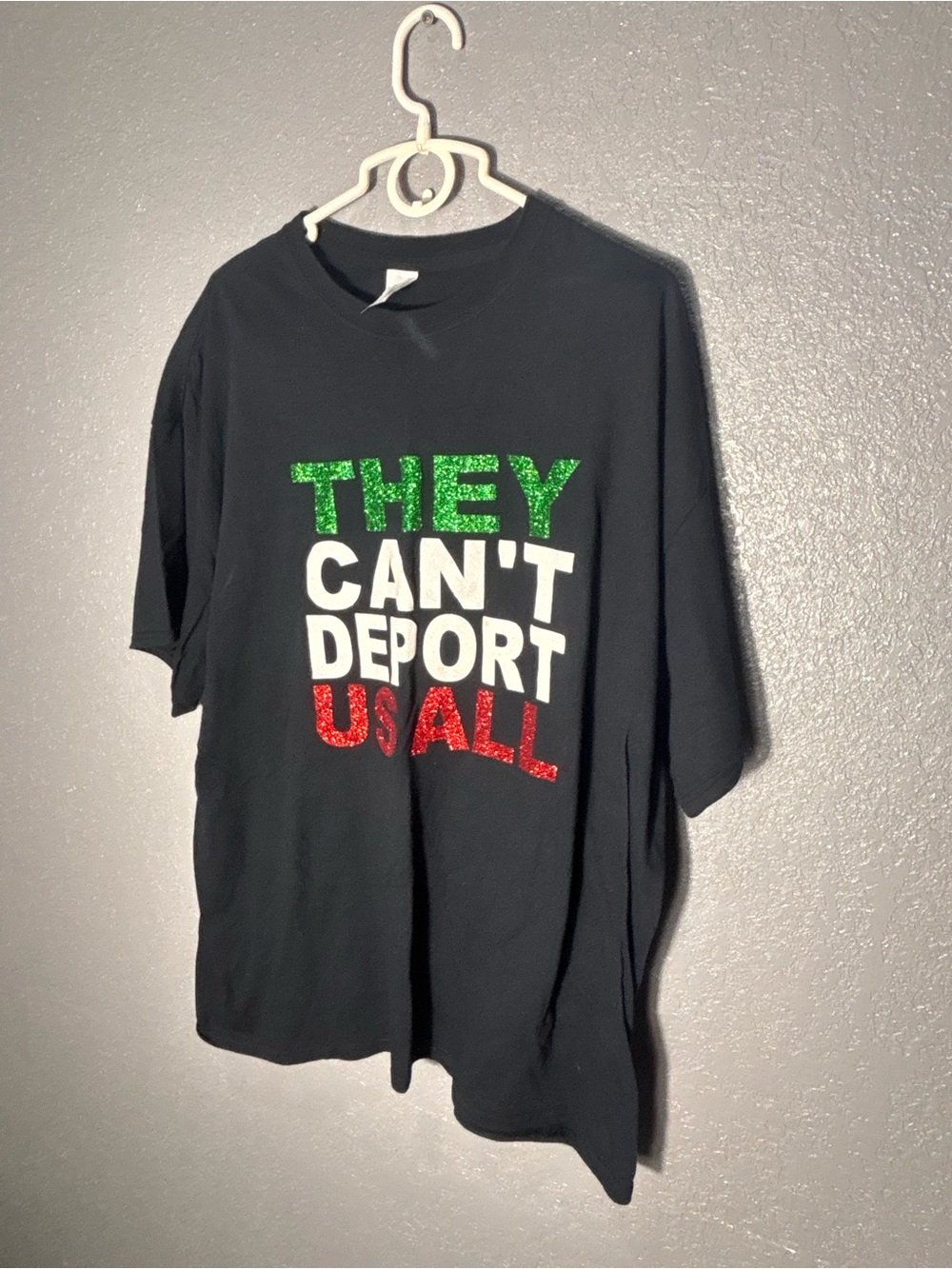 Black Short Sleeve Tee with Green, White & Red Glitter Slogan